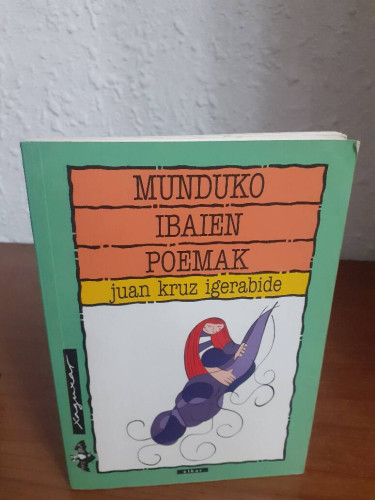 Portada del libro de MUNDUJO IBAIEN POEMAK