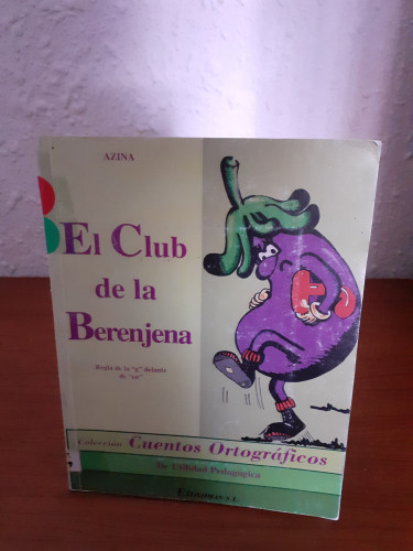 Portada del libro de El Club de la Berenjena. Regla de la g delante de en