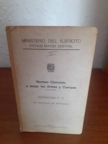 Portada del libro de NORMAS COMUNES A TODAS LAS ARMAS Y CUERPOS INTRUCCION E 72 EL COMBATE EN MONTAÑA