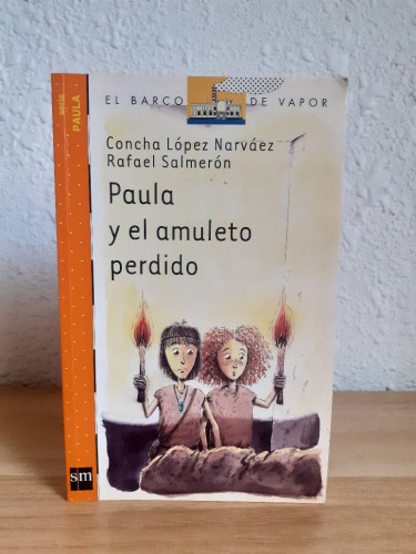 Portada del libro de PAULA Y EL AMULETO PERDIDO