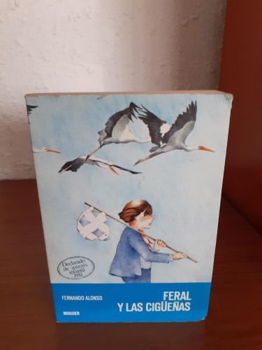 Portada del libro de Feral y las cigüeñas